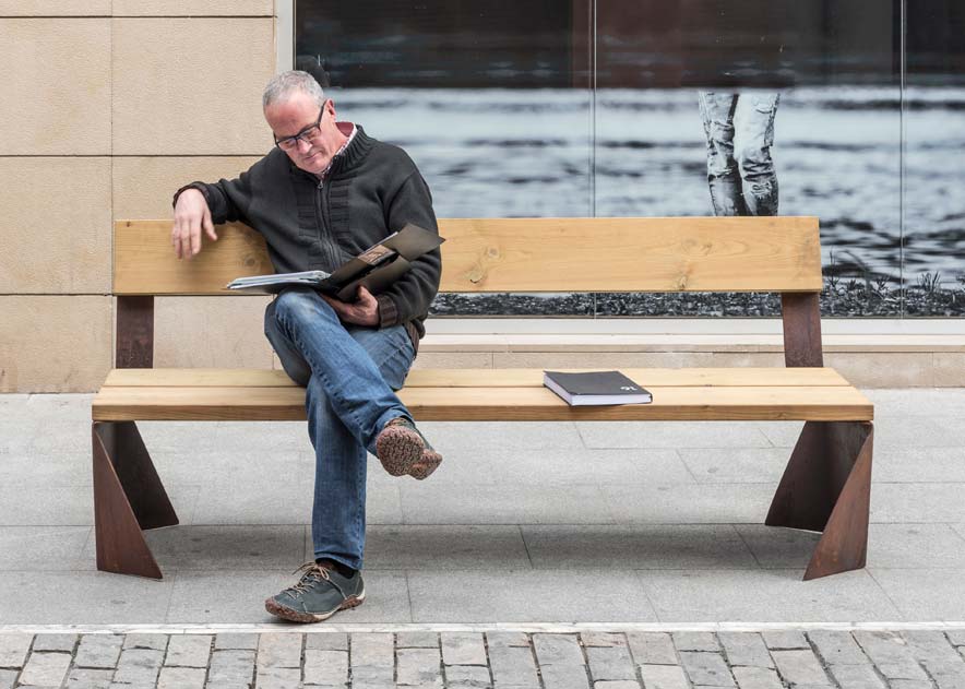 Street furniture with benches, litter bins, bollards, planters and equipment , Benches , UB17PT Bench Lao , Lao bench, rustic style but at the same time sophisticated in its design.