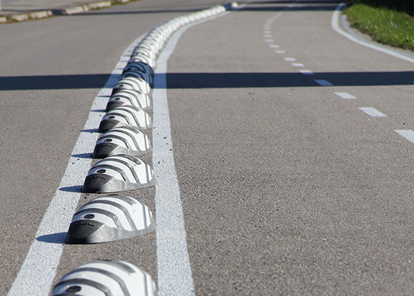 Street furniture with benches, litter bins, bollards, planters and equipment , Complements , UVM12ECO Gota cycle lane separator , 